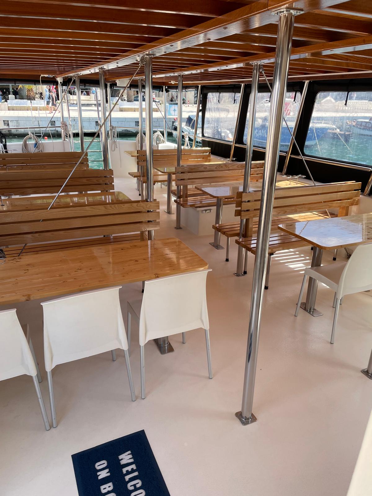 Wooden tables and benches on Borna's deck